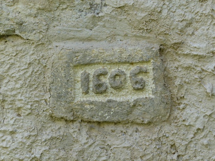 Date portée de 1606, sur la ferme de Macuègne Bas.