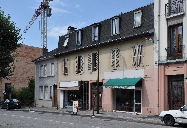 Édifice artisanal, entreprise de charpenterie, puis maison et atelier, entreprise de menuiserie Cochet François, puis café-restaurant Gréloz, actuellement immeuble