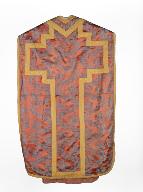 chasuble, étole, manipule : ornement orangé.