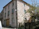 Maison, café puis école, actuellement maison