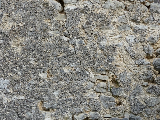 Enduit rustique sur un entrepôt agricole, au quartier du Terron.